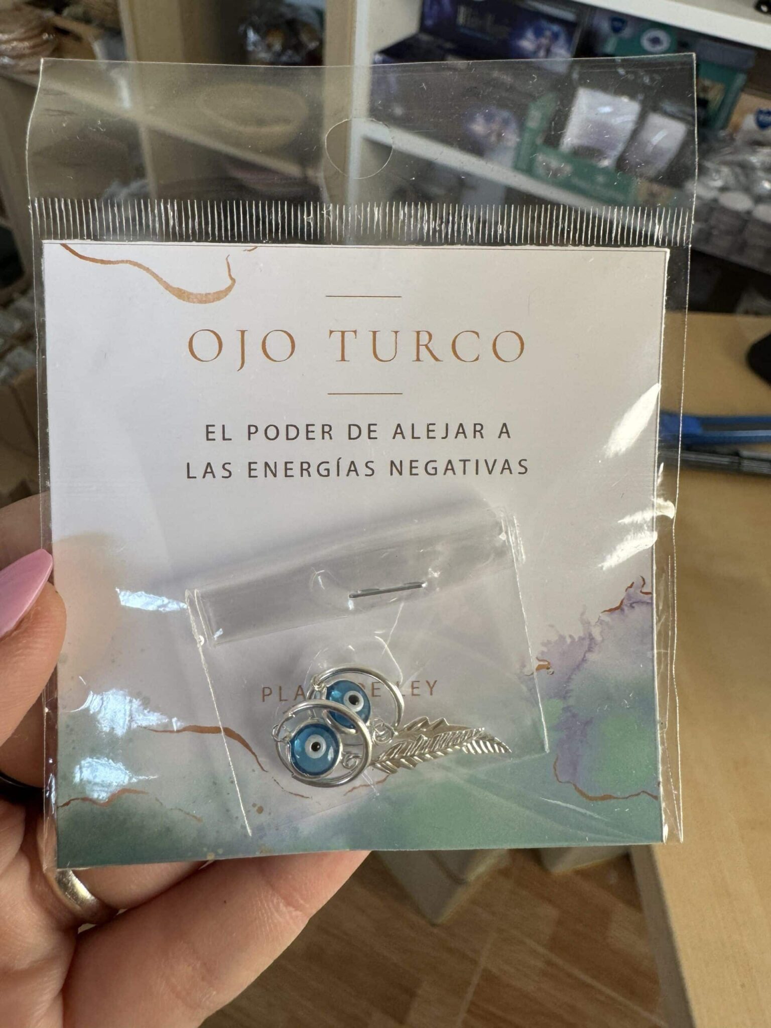 Pendientes ojo turco con pluma