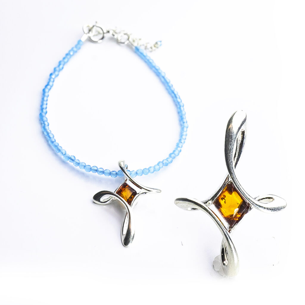 Cruz nudo ámbar báltico