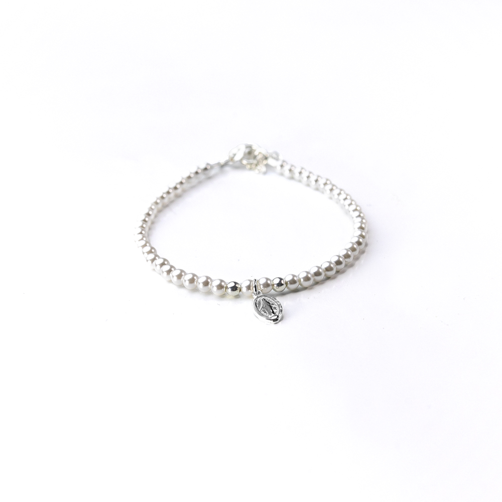 Pulsera perla 2 mm con milagrosa consagrada