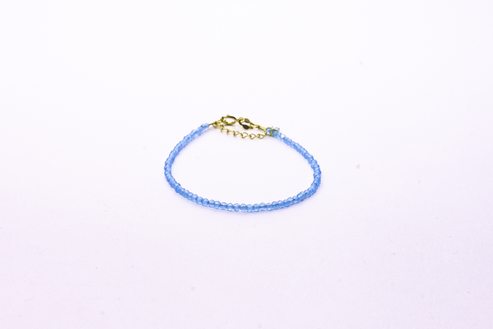 Pulsera topacio azul dorada